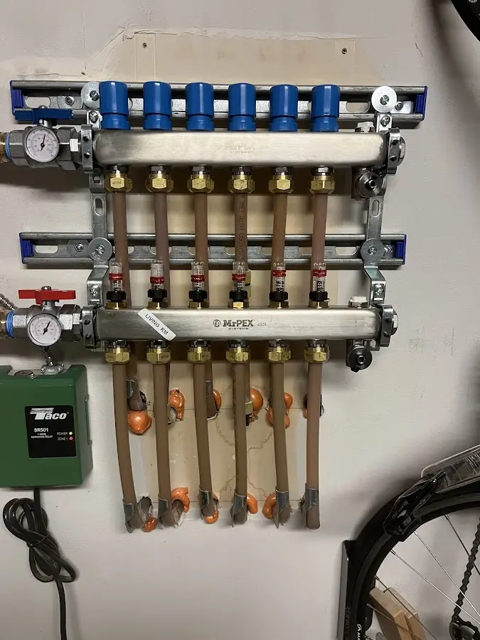 Plumber performing Water Heater Repair at a residential property in Shoreview